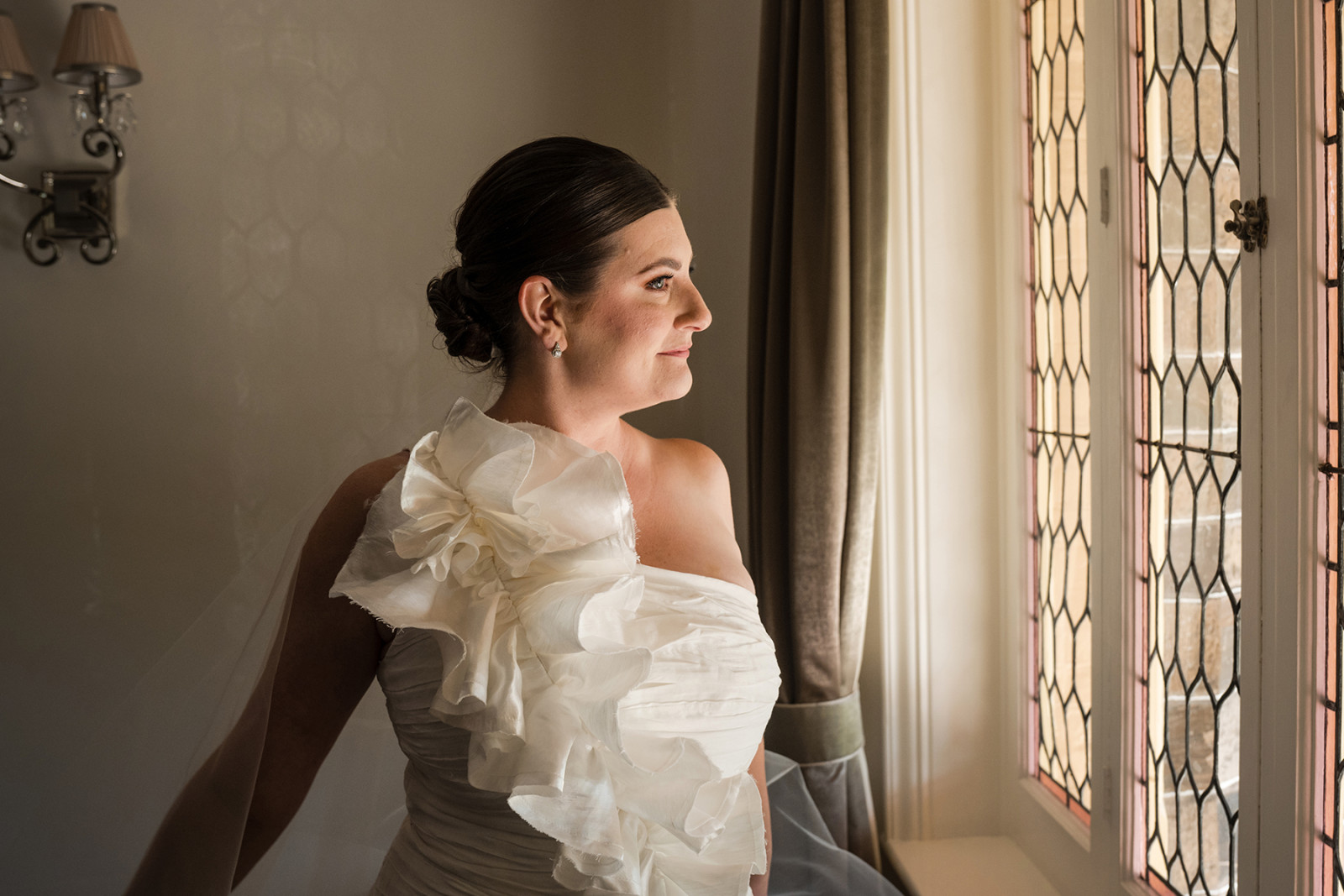 bride looking out window