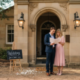 Couple reviewing venue with historic estate