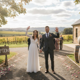 Couple greeting guests at Adelaide vineyard wedding