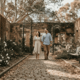Couple exploring Adelaide historic wedding venue