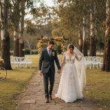 Couple walking outdoor Adelaide wedding venue