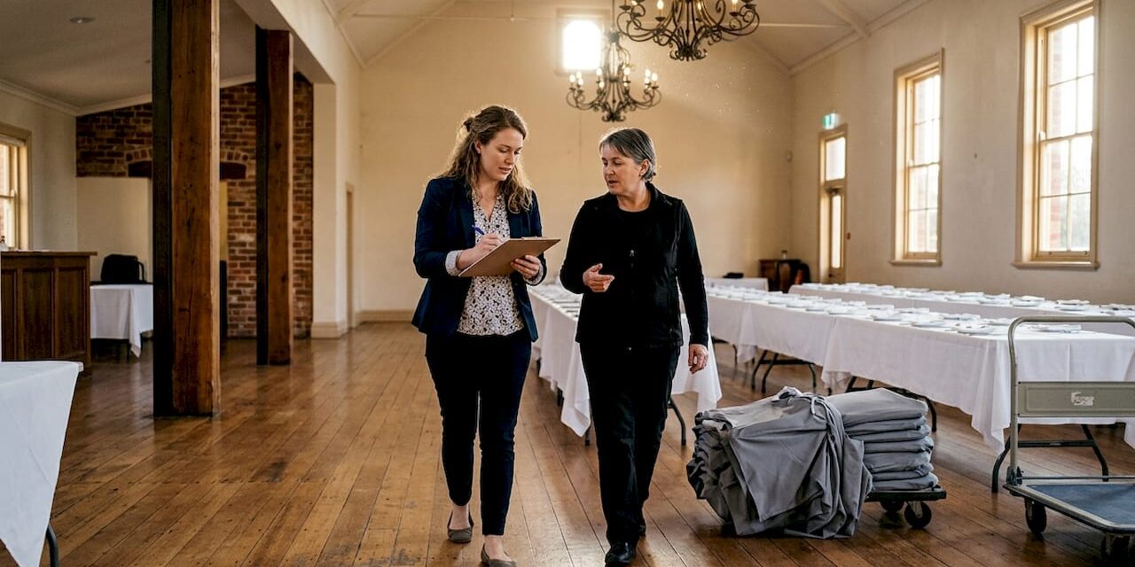 https://adelaideweddingvenues.com/new/wp-content/uploads/2026/04/1775959050218_Wedding-planner-checks-venue-hire-details-1280x640.jpeg