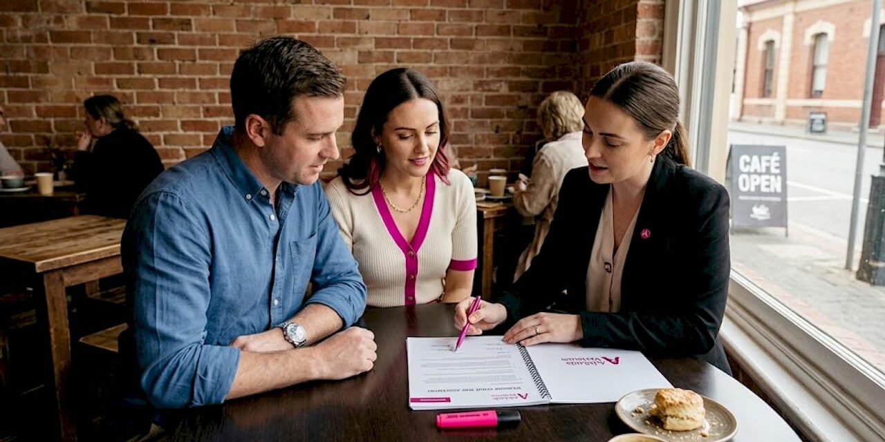 https://adelaideweddingvenues.com/new/wp-content/uploads/2026/04/1777178297395_Couple-discusses-wedding-venue-contract-at-cafe-1280x640.jpeg