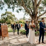 Couple greeting guests at Adelaide garden wedding venue