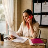 Wedding planner reviewing venue documents