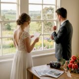 Couple planning wedding overlooking Adelaide city