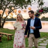 Couple touring outdoor wedding venue