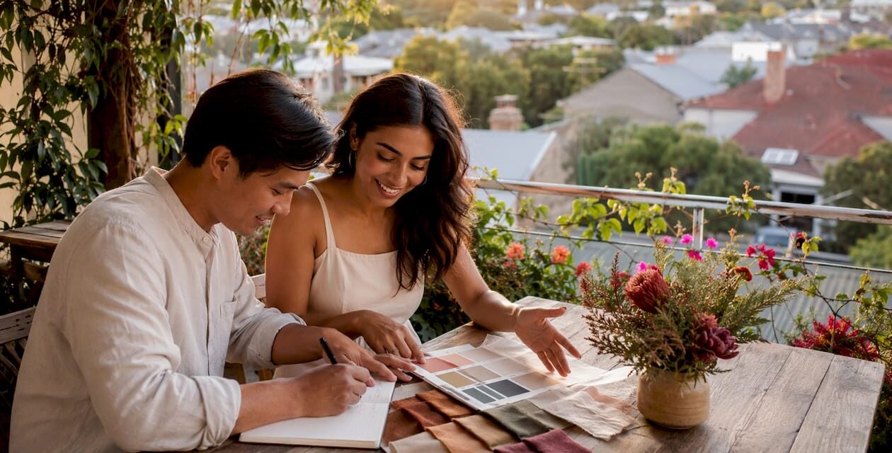https://adelaideweddingvenues.com/new/wp-content/uploads/2026/07/1784956342778_Couple-planning-wedding-theme-at-kitchen-table-1260x640.jpeg
