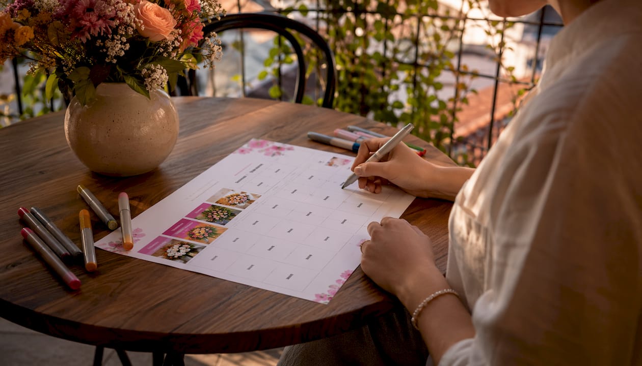 Venue comparison checklist for Australian couples 2 Hands pointing at venue comparison checklist sheet