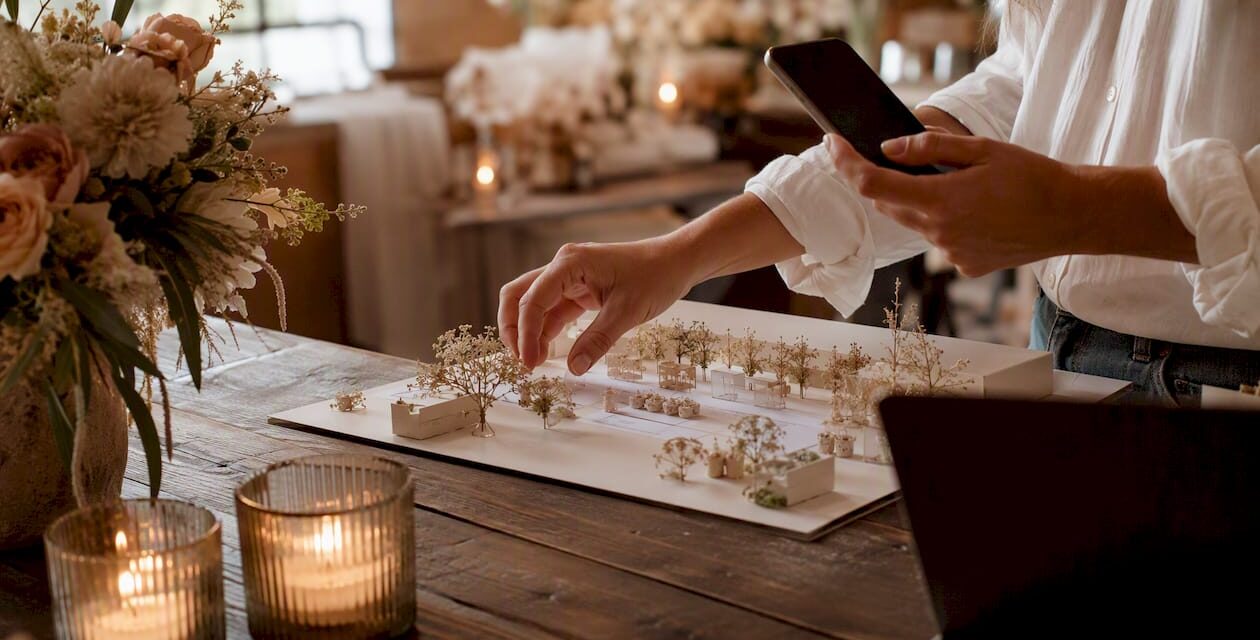 https://adelaideweddingvenues.com/new/wp-content/uploads/2026/08/1786085464382_Event-organizer-hands-with-phone-and-event-setup-1260x640.jpeg