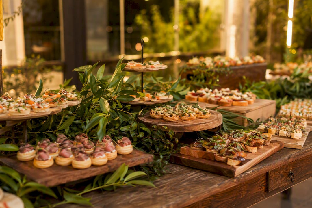 Cocktail vs seated reception: which suits your wedding? 3 Wedding cocktail reception food station with canapés